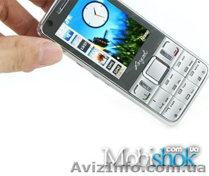 Продам мобильный телефон на 2 сим карты +аналоговое TV  Anycool T518  #15458