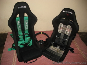 Cпортивное сиденье (ковш) BRIDE,  Sparco,  Recaro;  ремни безопасности TAKATA,  OMP #43941