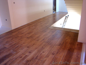 Укладка паркетной доски,  ламината. Монтаж плинтуса. #278155