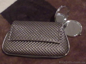 Продается  косметичка из рельефного кожзама (очень красивый дизайн и удобная в и #443598