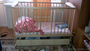 Продам детскую кроватку б/у RADEK II (сосна) с ящиком и качалкой на пружине #497400