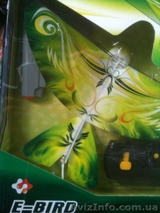 Летающая птица на дистанционном управлении с лазерным пистолетом. #584938