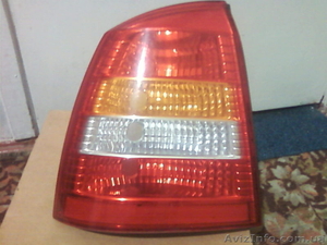 Фонарь задний, левый на Opel-Astra classic.Оригинал 2008 года.Цена 500 гривень... #572079