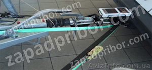 НТС-5000 - пристрій для регульованого натиску на механізм управління #684859