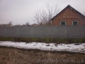 Продам участок в Печенеги,  центральная улица #724630