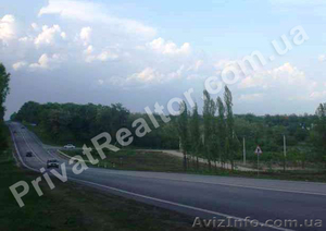 Участок 48 соток,  красная линия трассы,  10 км от Харькова. #745262