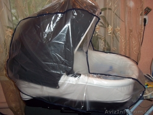 Універсальний дощовик на коляску з віконцем #790283