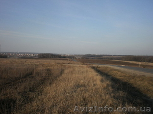 Участок   г.Харьков 6 га ,  граничит с трассой ,   круглогодичный подъезд   автотр #960433