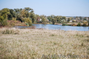Предлагается  к продаже в Печенегах на берегу  под гостиницу ,  базу отдыха ,  озд #961648