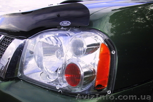 защита фар (пластик) Nissan Navara / Frontier (D22) с 2002 г.в. #1009040