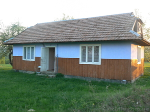 Продам деревяний будинок площею 50м.кв. земельна ділянка 0.48г. #1011187