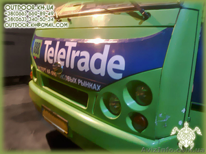 Прикатка рекламной пленки Оракал на витрины авто     #1017646