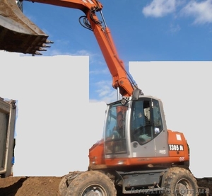 Продаем колесный экскаватор ATLAS 1305 M,  0, 75 м3,  2006 г.в. #1165050