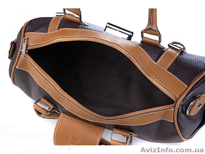 Мега-модная сумка-саквояж изготовлена из прочного материала. #1185402