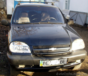 Нива Шевроле 2006 4х4 1, 7л цвет черный #1218842