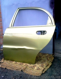 Битая под рехтовку задняя правая дверь на авто Daewoo Lanos   #1254306