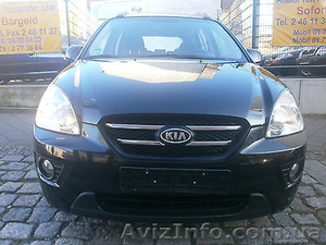 Kia Carens III капот бампер фари двері крила скло #1308909