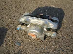 Тормозной суппорт Lanos 1, 5 левый #1325646