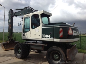 Услуги полноповоротного экскаватора Атлас 1304 по Харькову и области #1367845