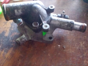 Корпус термостата Opel Combo Nissan  Astra,   Renault,   Mazda,   Ford Mondeo від 3 #1447840