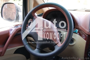 Перетяжка  автомобильного руля винилом  #1555814