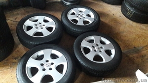 диски оригинальные nissan r16 с лееними шинами #1606257