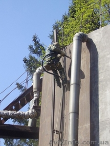 Пескоструйная очистка резервуара. Антикоррозионная защита внутри и снаружи #1610409